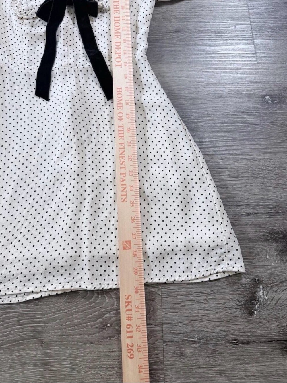 Reformation Kaylia Polka Dot Mini Dress in cream with a black bow - Picture 6 of 9